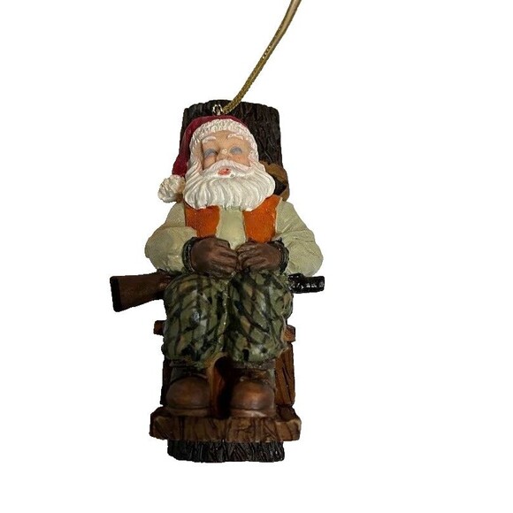 Christmas Santa Hunter Sitting w/Gun Ornament Painted Resin Cabincore Rustic - Picture 1 of 3
